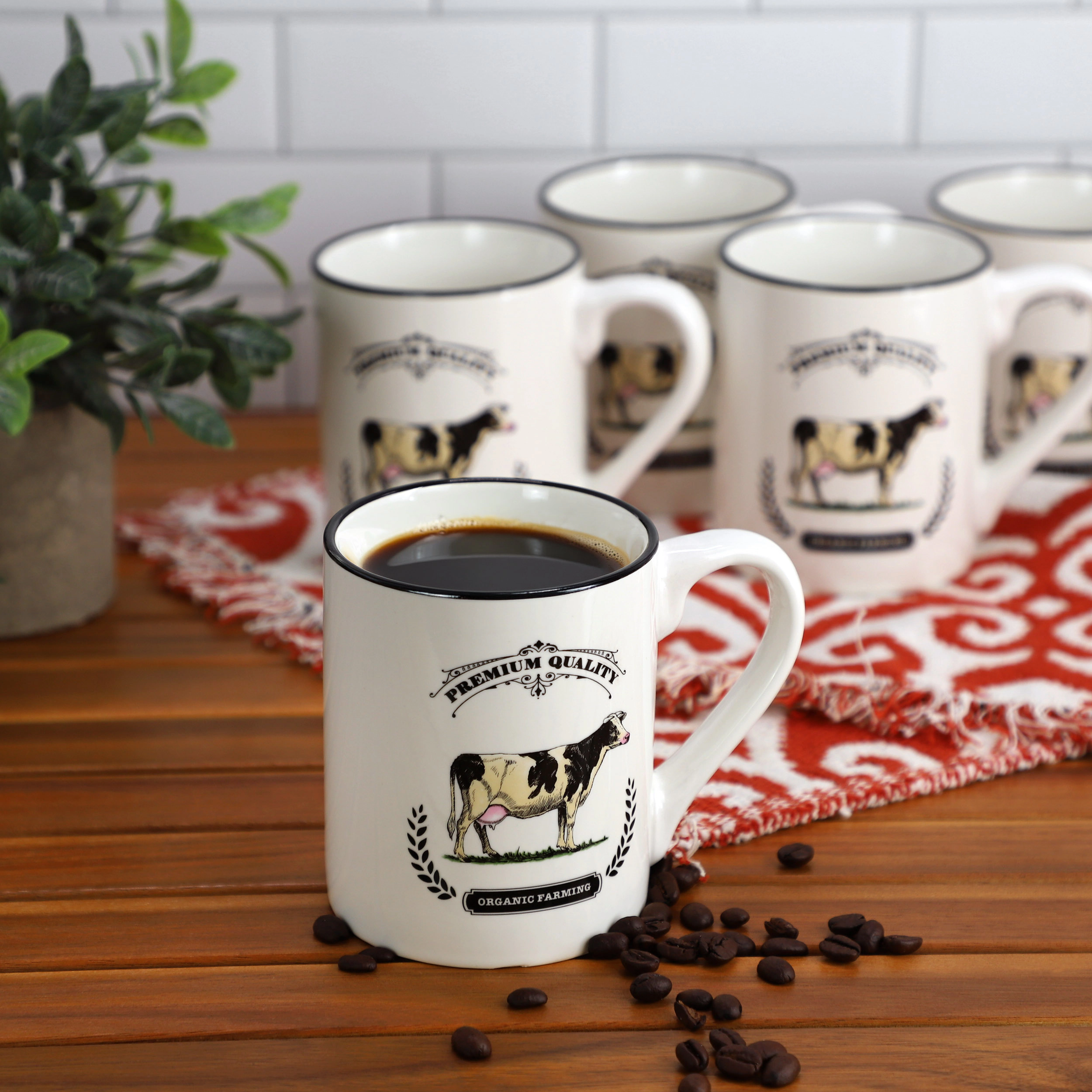 Gibson Home Barn Animals 8 Piece 17 Ounce Decorated Cow Mugs in White and Black