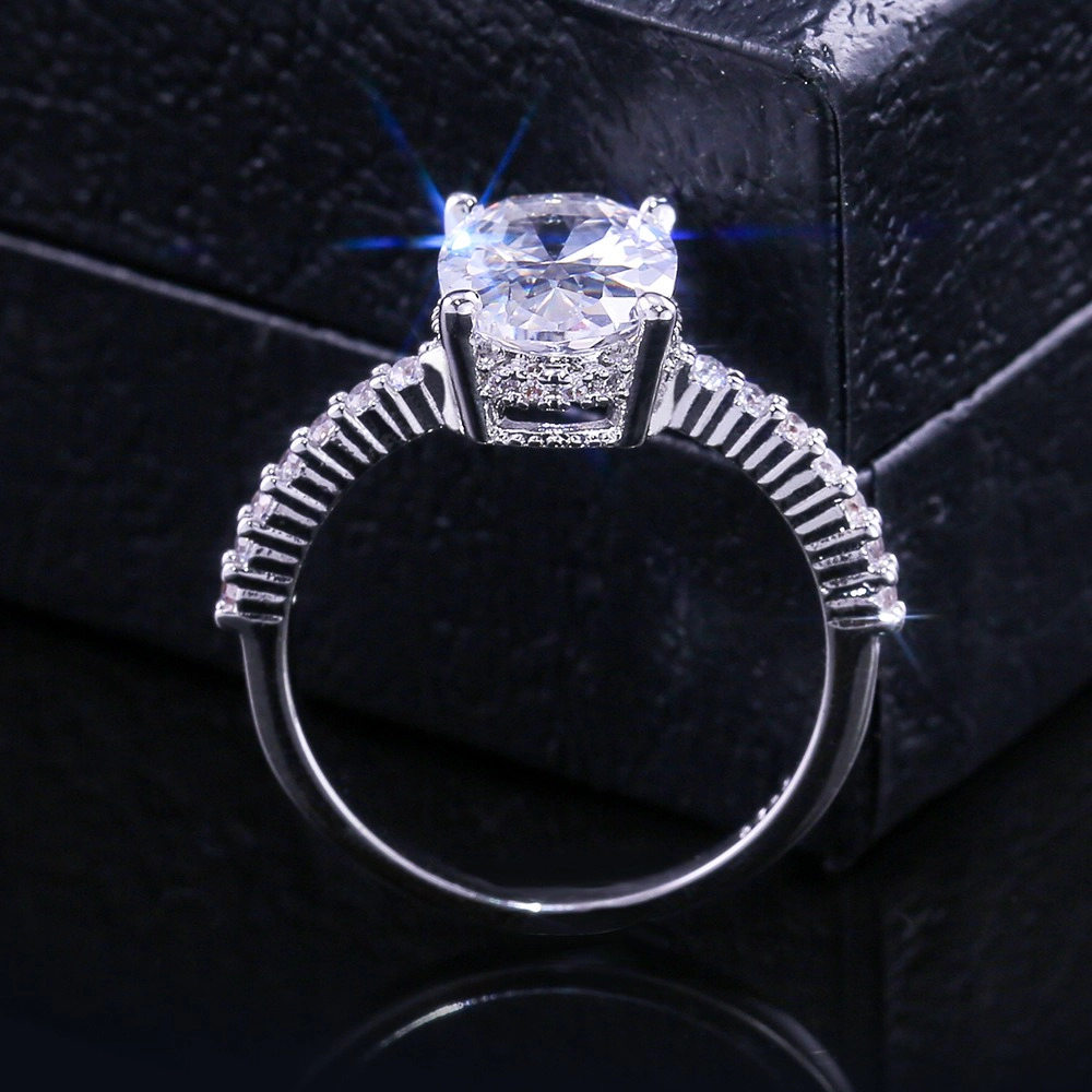 Wardrobe Whimsy Oval Cut Cubic Zirconia Hidden Halo Pave Shank Engagement Ring
