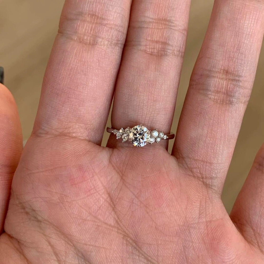Wardrobe Whimsy Round Cut Cubic Zirconia Side Stone Engagement Ring