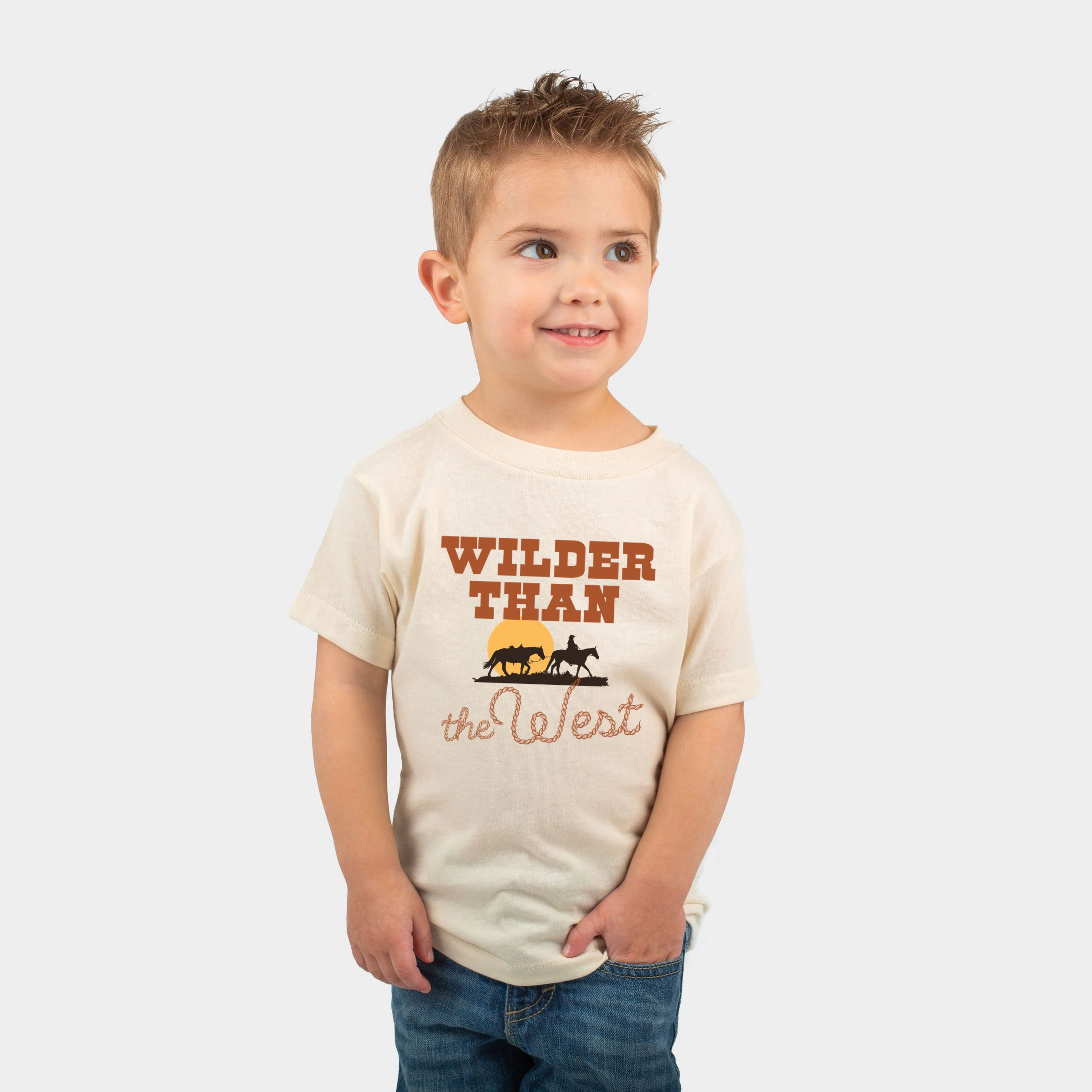 The Juniper Shop - Wilder Than West Bold Toddler Short Sleeve Graphic T-Shirt