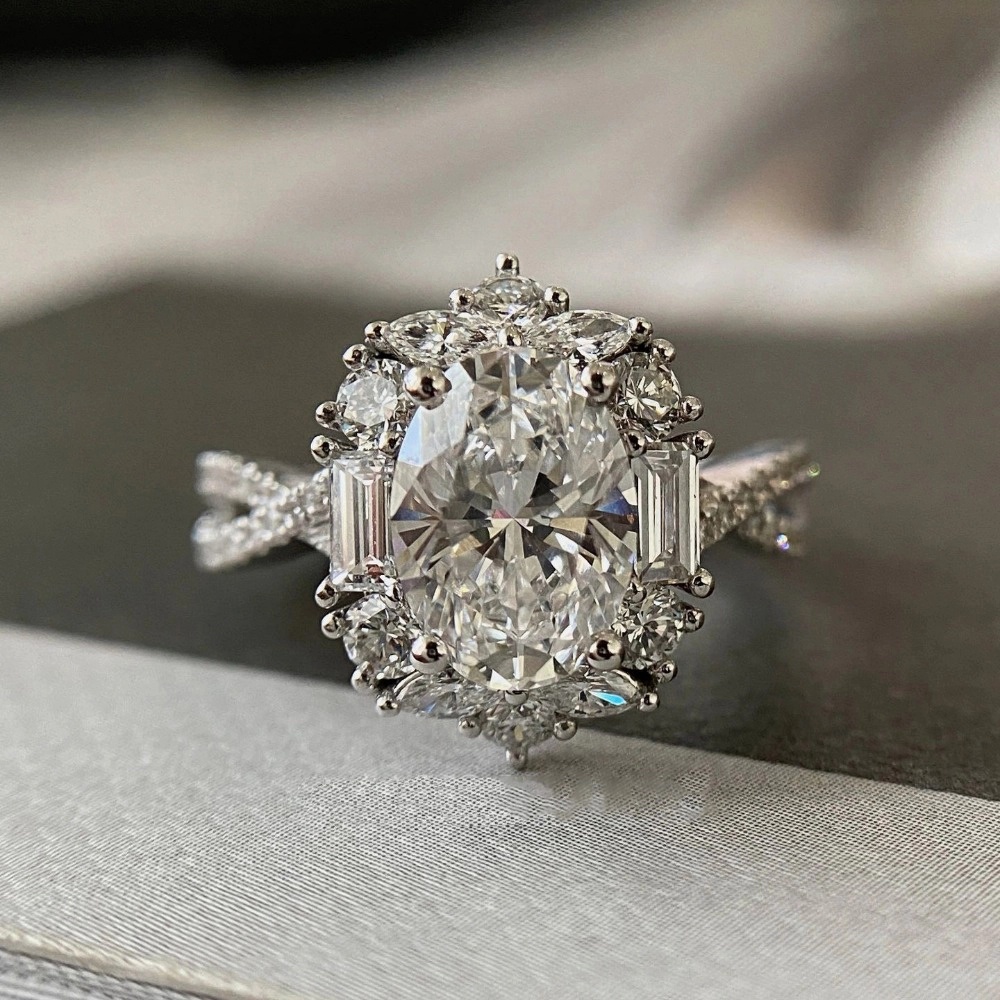 Wardrobe Whimsy Oval Cut Cubic Zirconia Halo Twisted Shank Engagement Ring
