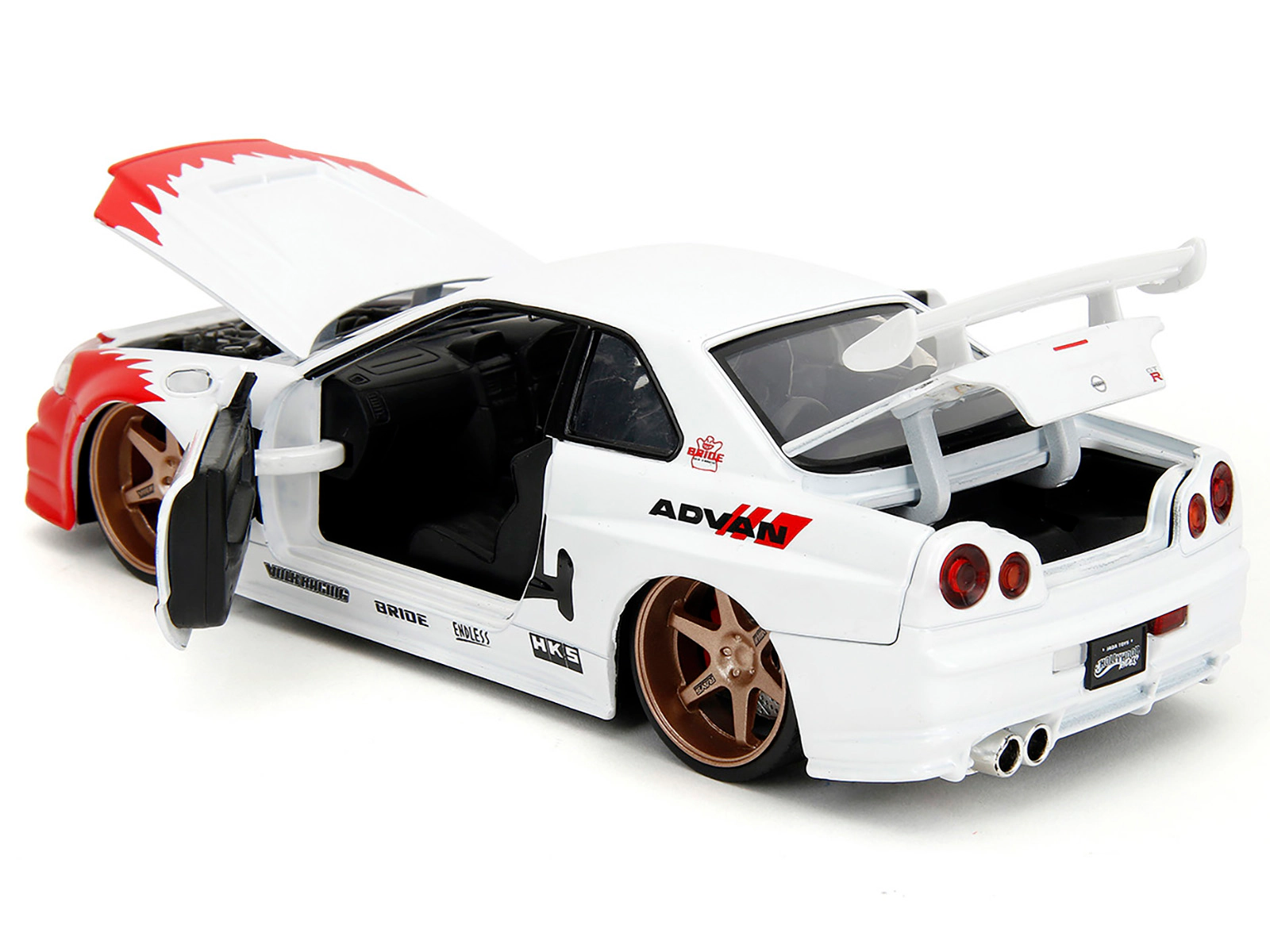 Jada 2002 Nissan Skyline GT-R (R34) RHD (Right Hand Drive) White with Red Graphics and Ryu Diecast Figure