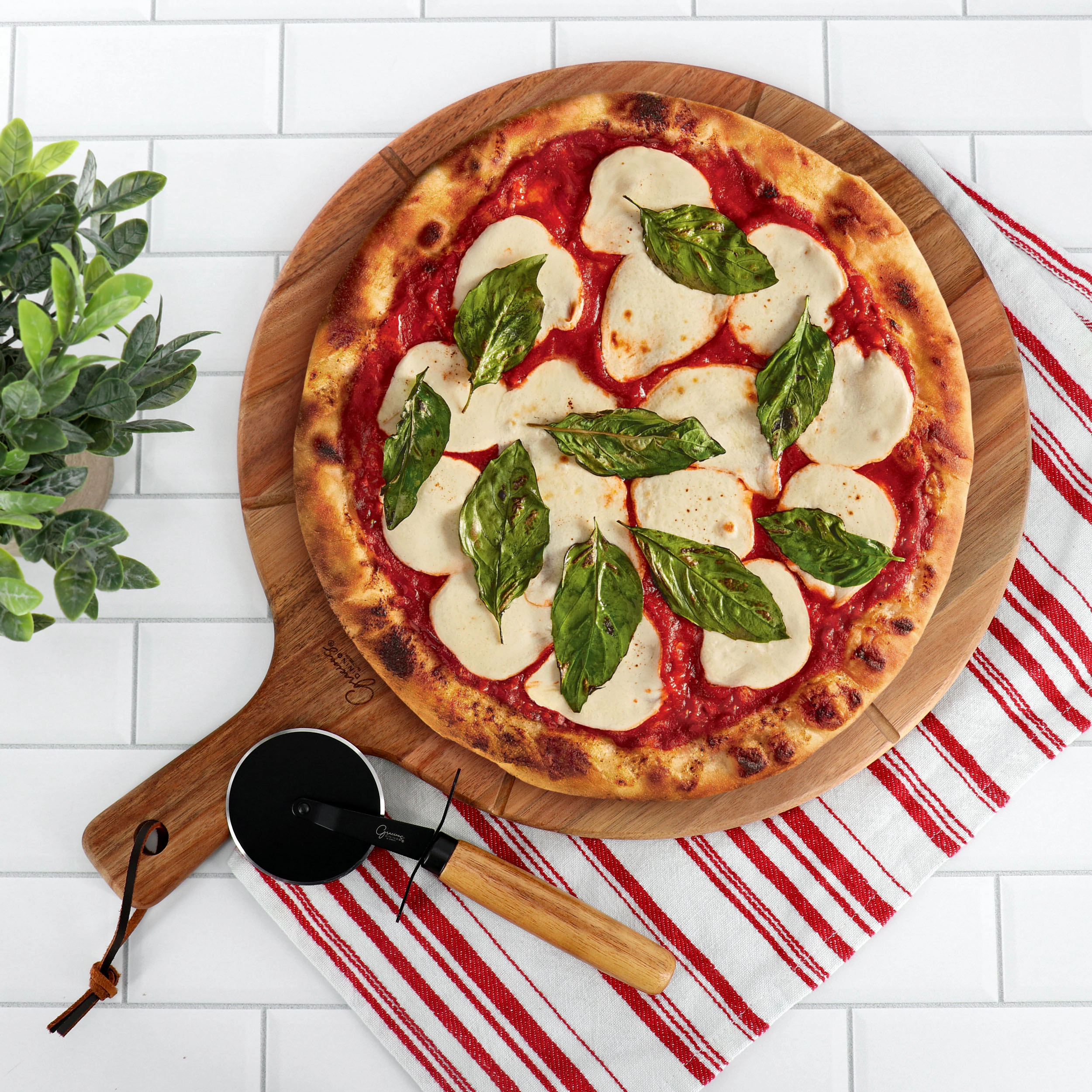 Gibson Elite 2 Piece Acacia Wood Serving Board and Pizza Cutter Set in Brown
