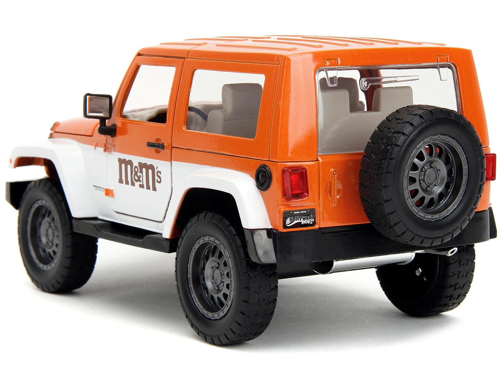 Jada 2007 Jeep Wrangler Orange Metallic and White and Orange M&M Diecast Figure "M&M's" "Hollywood Rides"