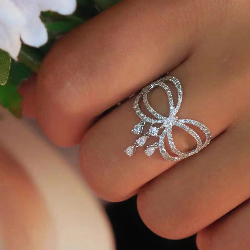 Wardrobe Whimsy Bow Shape Dangling Cubic Zirconia Statement Ring for Women