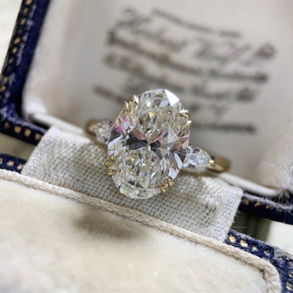 Wardrobe Whimsy Oval Cut Cubic Zirconia Three Stone Engagement Ring for Women