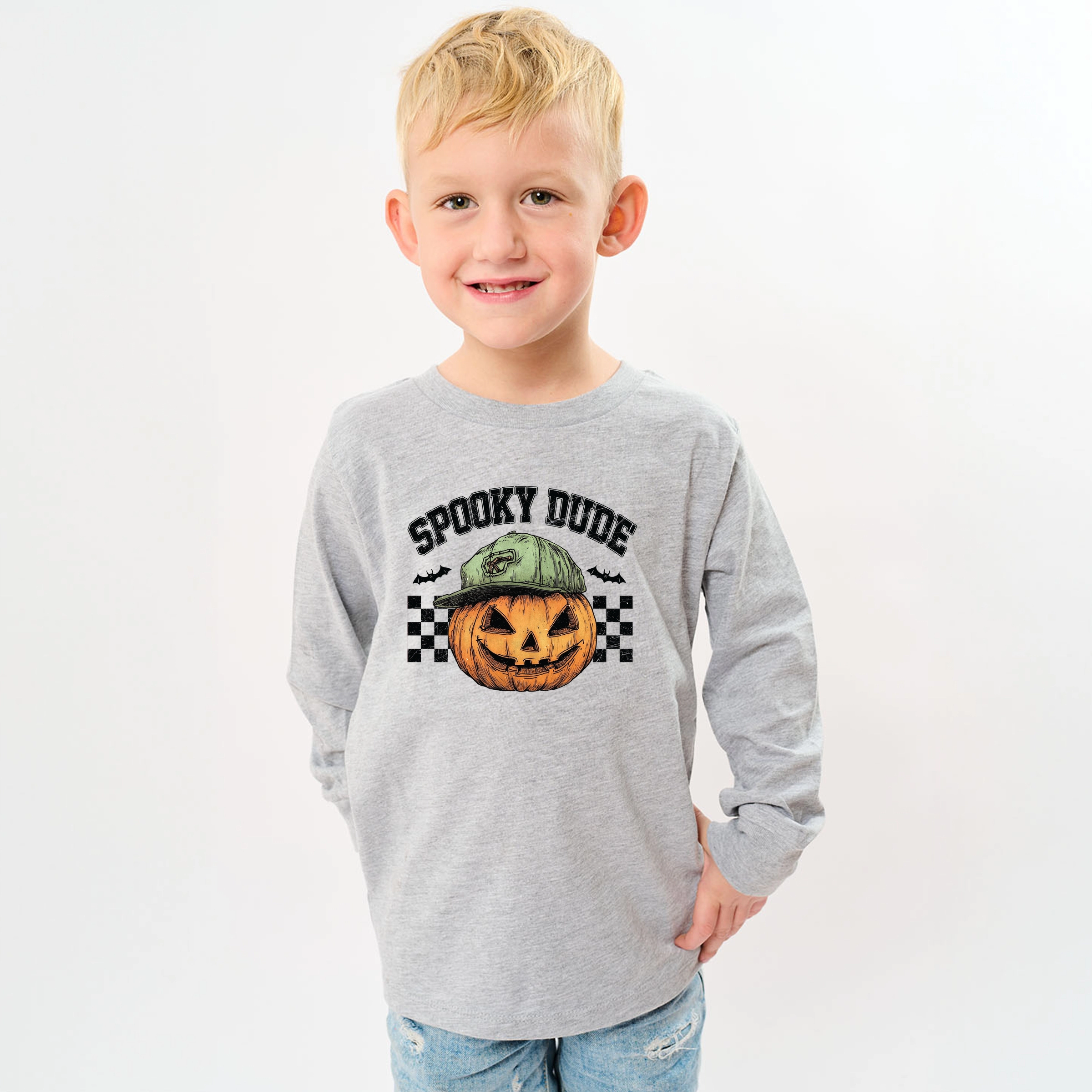 The Juniper Shop - Youth Long Sleeve Graphic T-Shirt Spooky Dude Checkered Pumpkin