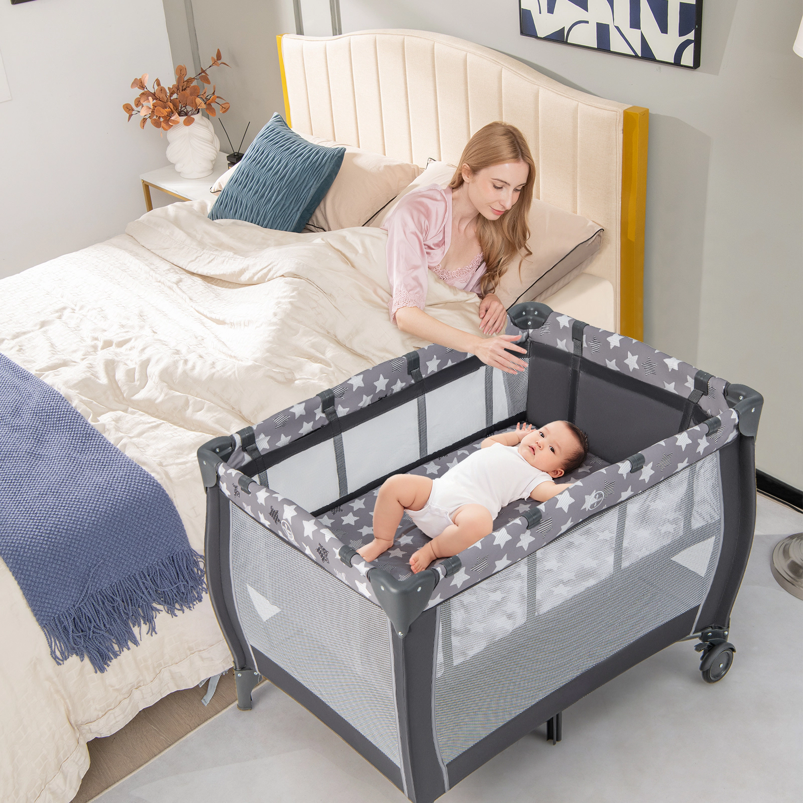 SUGIFT Portable Baby Playard with Changing Table Bassinet and Music Box 33-lb Capacity Ages 0-3 Years Gray