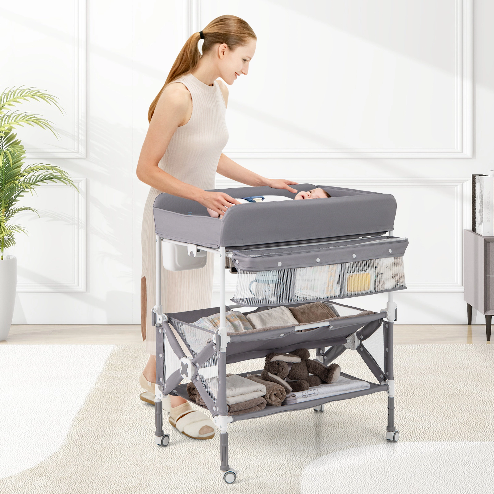 SUGIFT Portable Baby Changing Table Gray with Wheels Storage Basket and Trash Bin