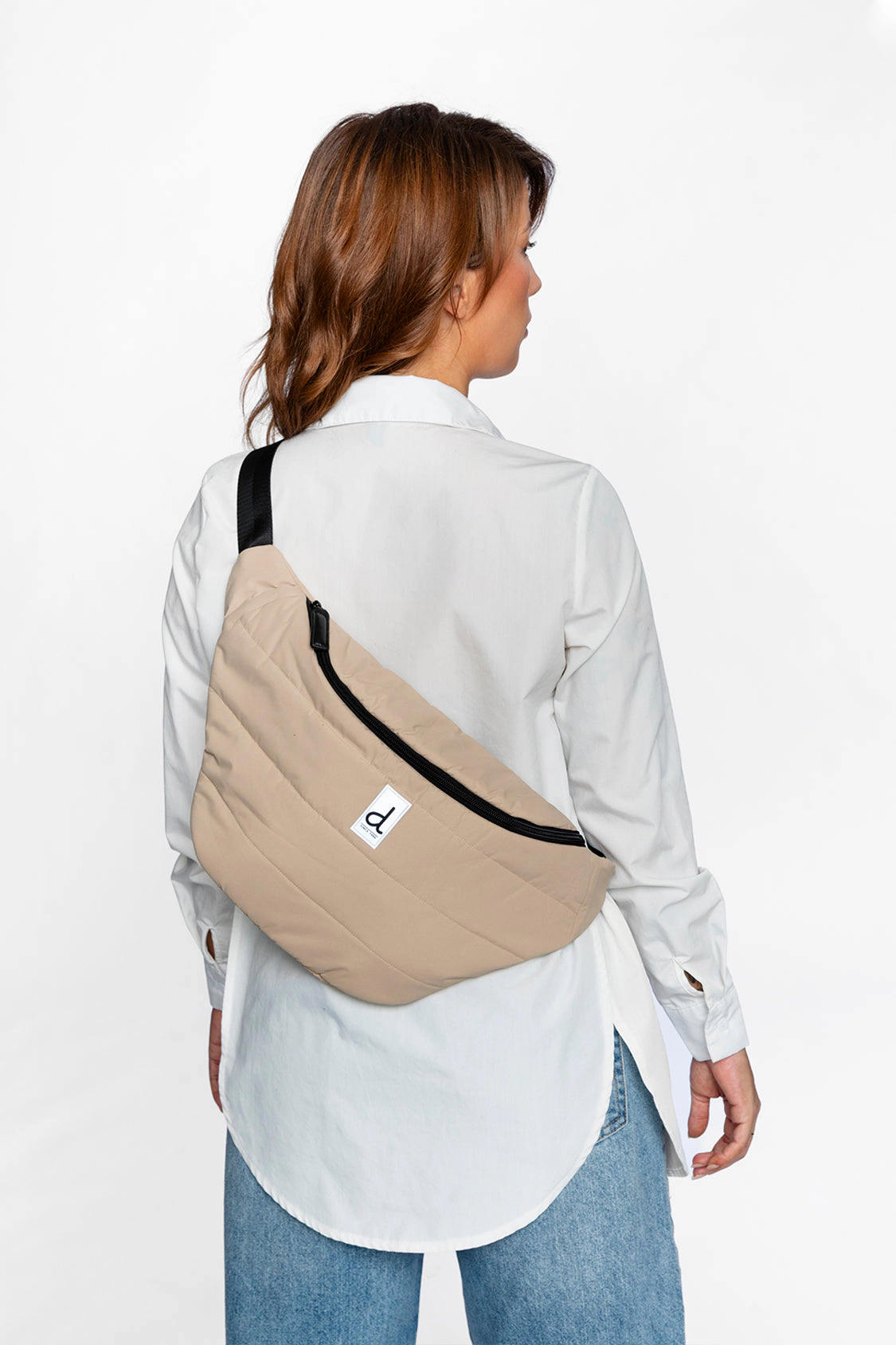 Deux par Unisex Water-Repellent Changing Sling Bag with Adjustable Strap