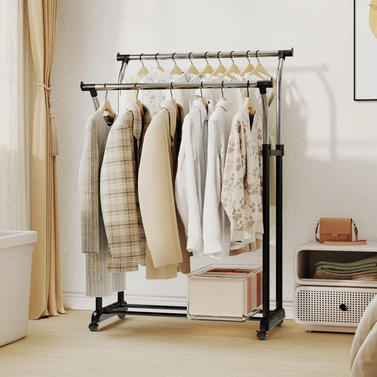 SUGIFT 42 to 69-in Adjustable Height 33-lb Rod Capacity Black Rolling Double Rod Clothes Garment Rack