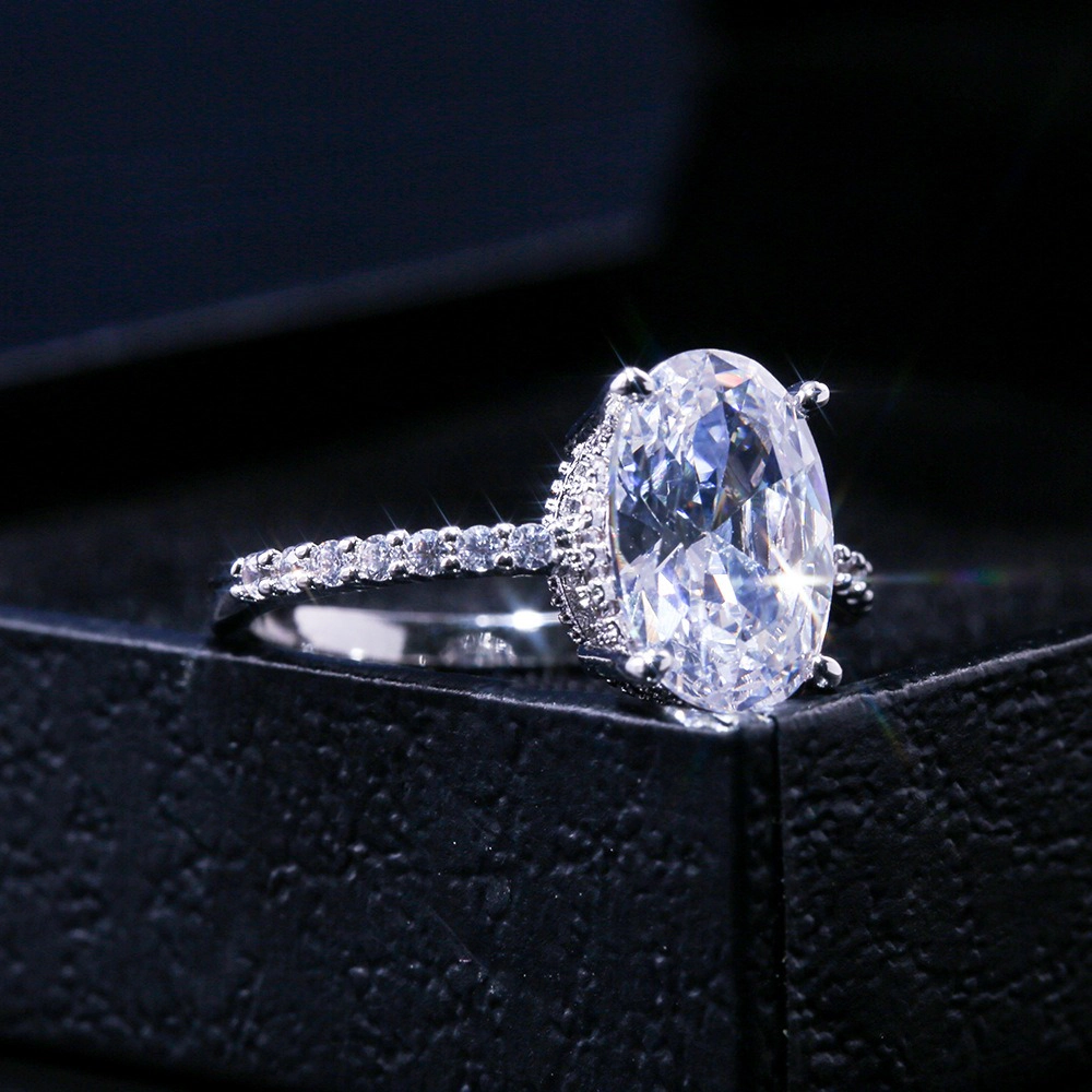 Wardrobe Whimsy Oval Cut Cubic Zirconia Hidden Halo Pave Shank Engagement Ring