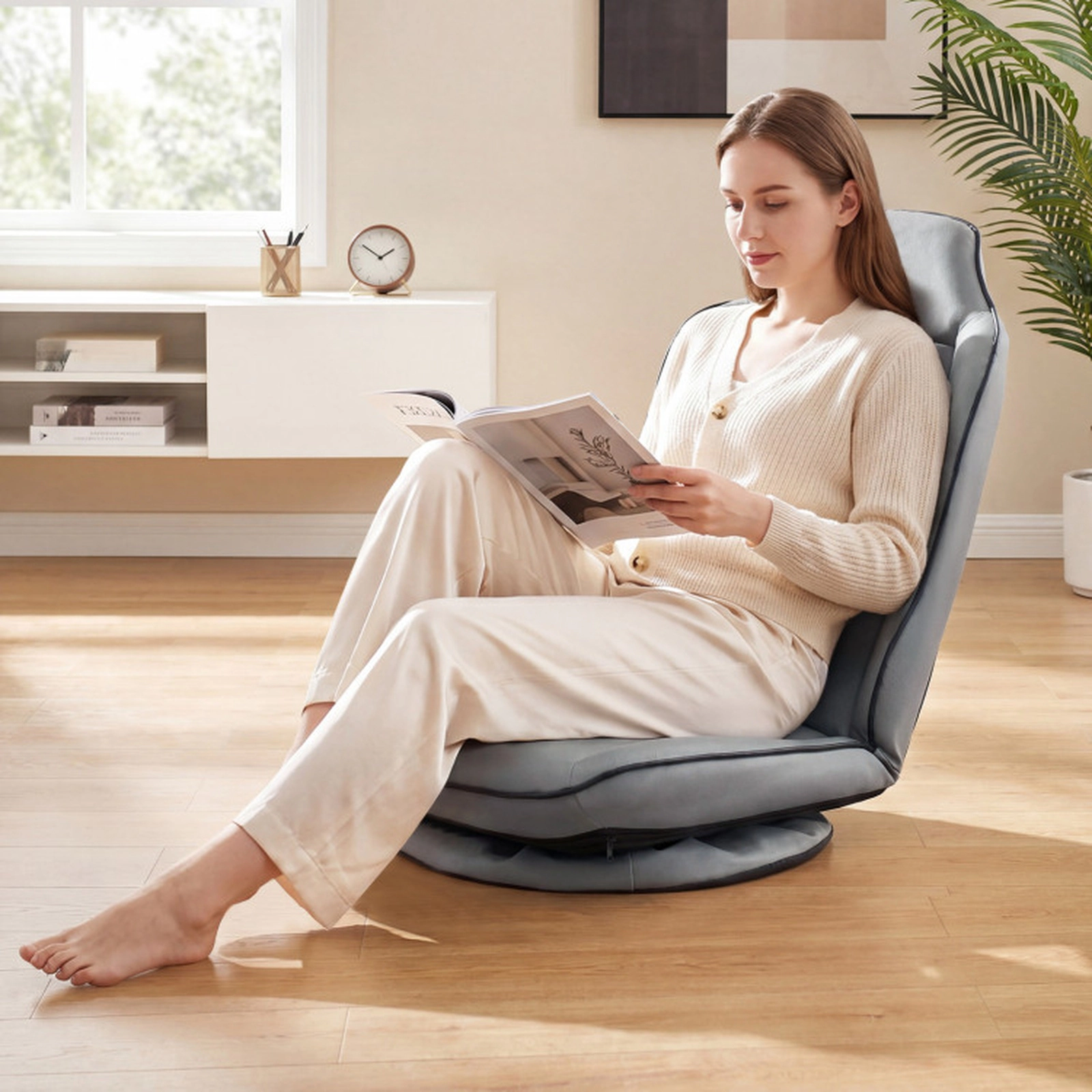 SUGIFT 360-Degree Swivel Floor Chair with 5-Level Adjustable Backrest and Padded Artificial Leather Seat