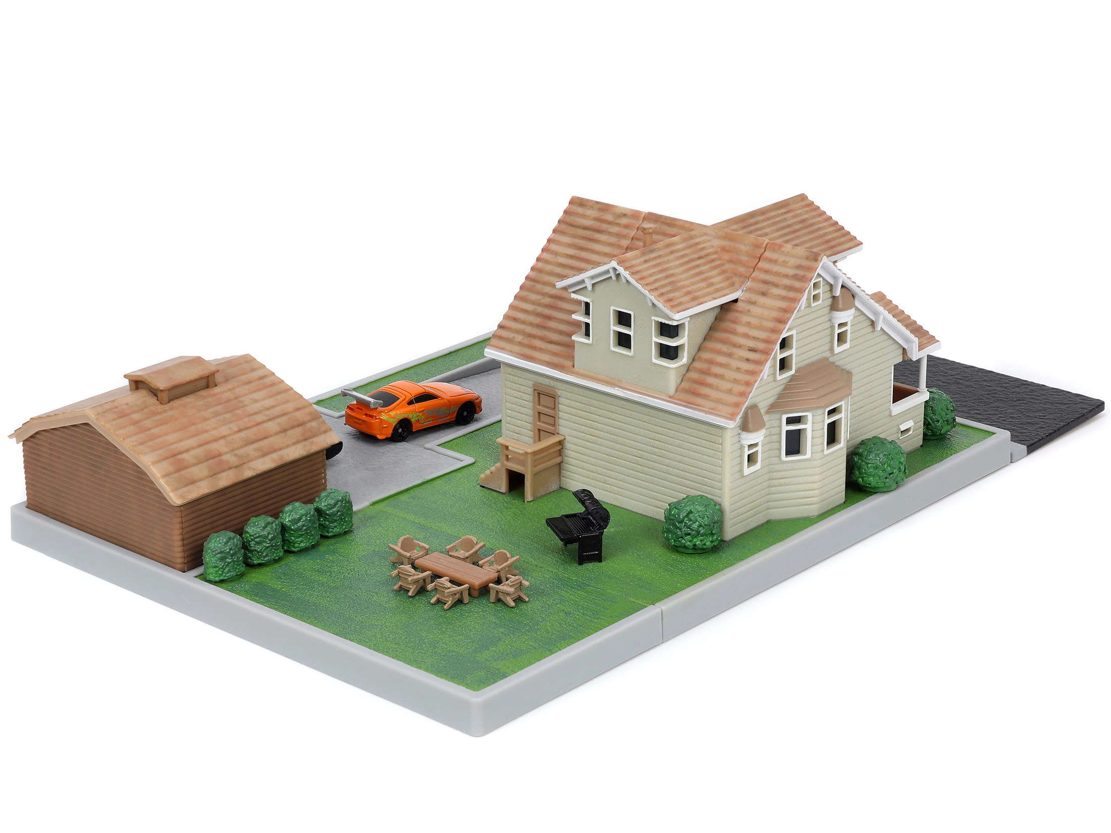 Jada Toretto House Diorama with Dodge Charger Black and Toyota Supra Orange with Graphics "Fast and Furious"
