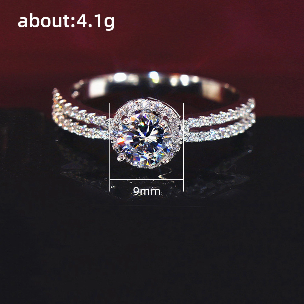 Graceful 4-Prong Setting Round Cubic Zirconia Ring