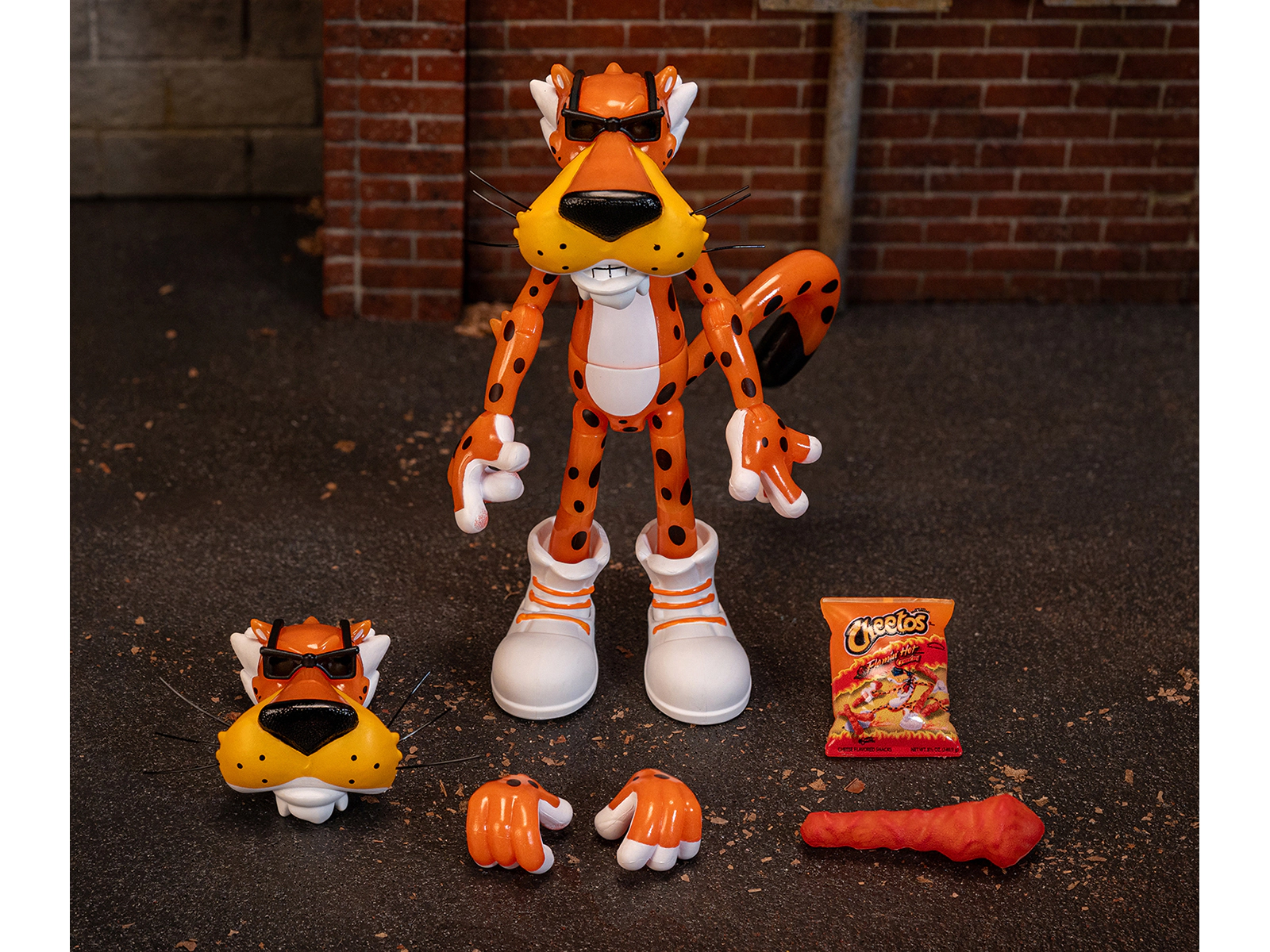 Jada Chester Cheetah 5.5" Glow-in-the-Dark Figure with Accessories and Alternate Head and Hands "Flamin' Hot