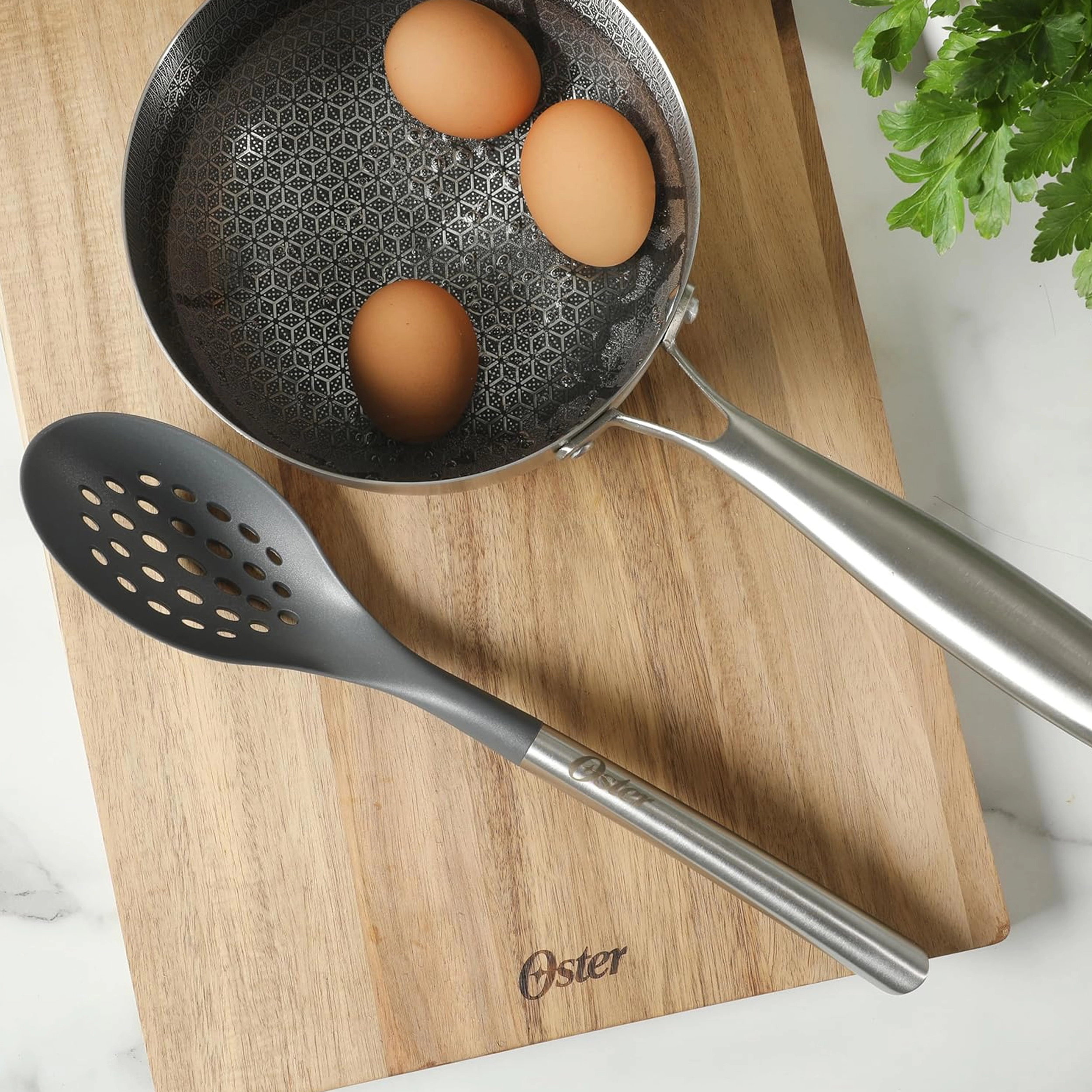 Oster Chadswyck 13.8 Inch Nylon Slotted Spoon With Stainless Steel Handle in Silver