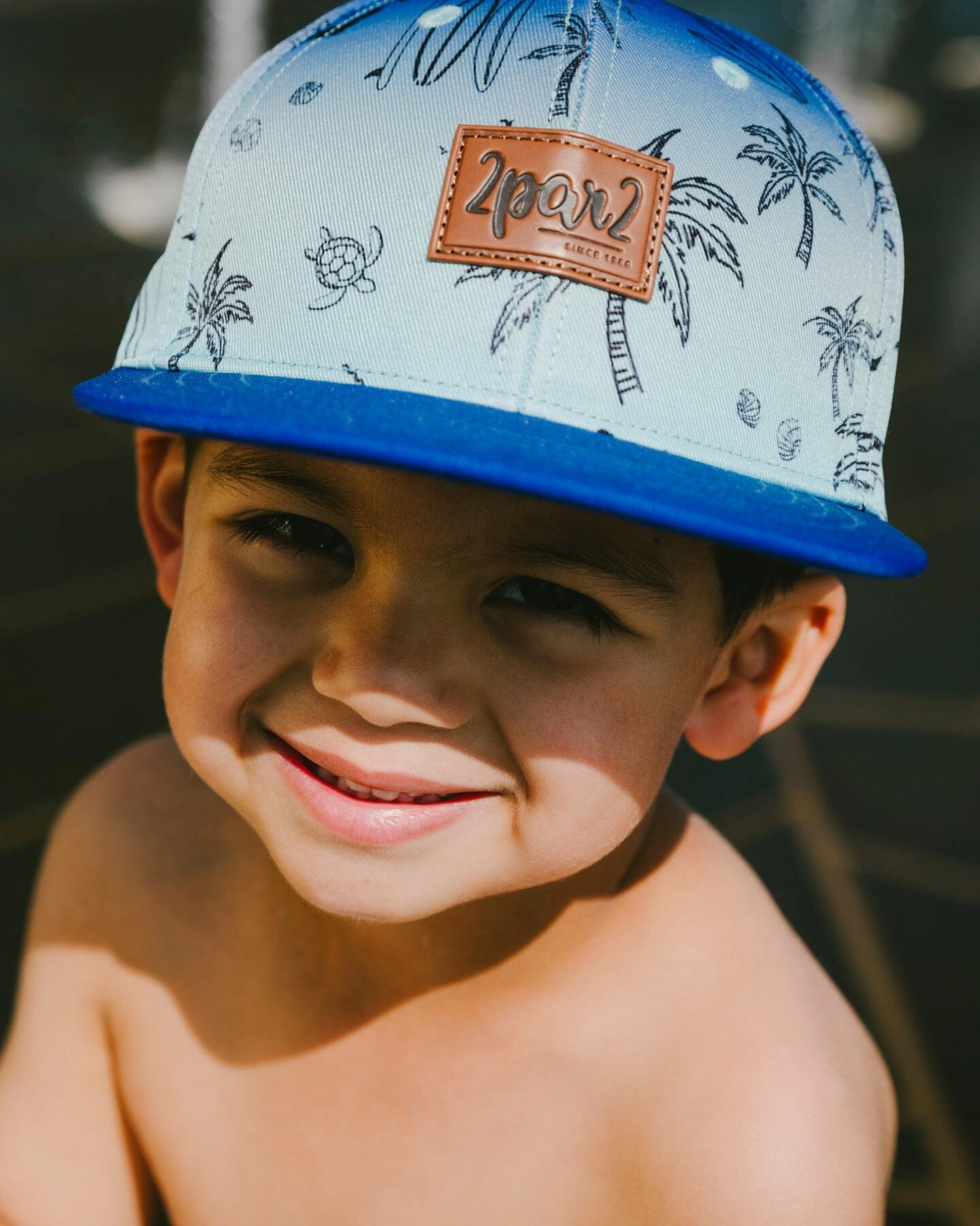 Deux par Boys Beach Print Contrast Brim Logo Patch Cap