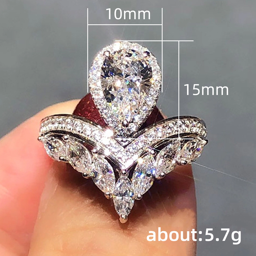 Wardrobe Whimsy Womens Pear Cut Halo Cubic Zirconia Ring Marquise Accent Twisted Cocktail Ring
