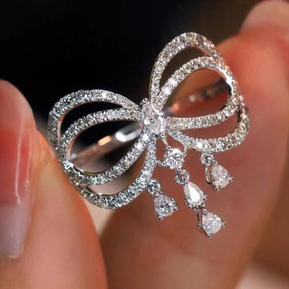 Wardrobe Whimsy Bow Shape Dangling Cubic Zirconia Statement Ring for Women