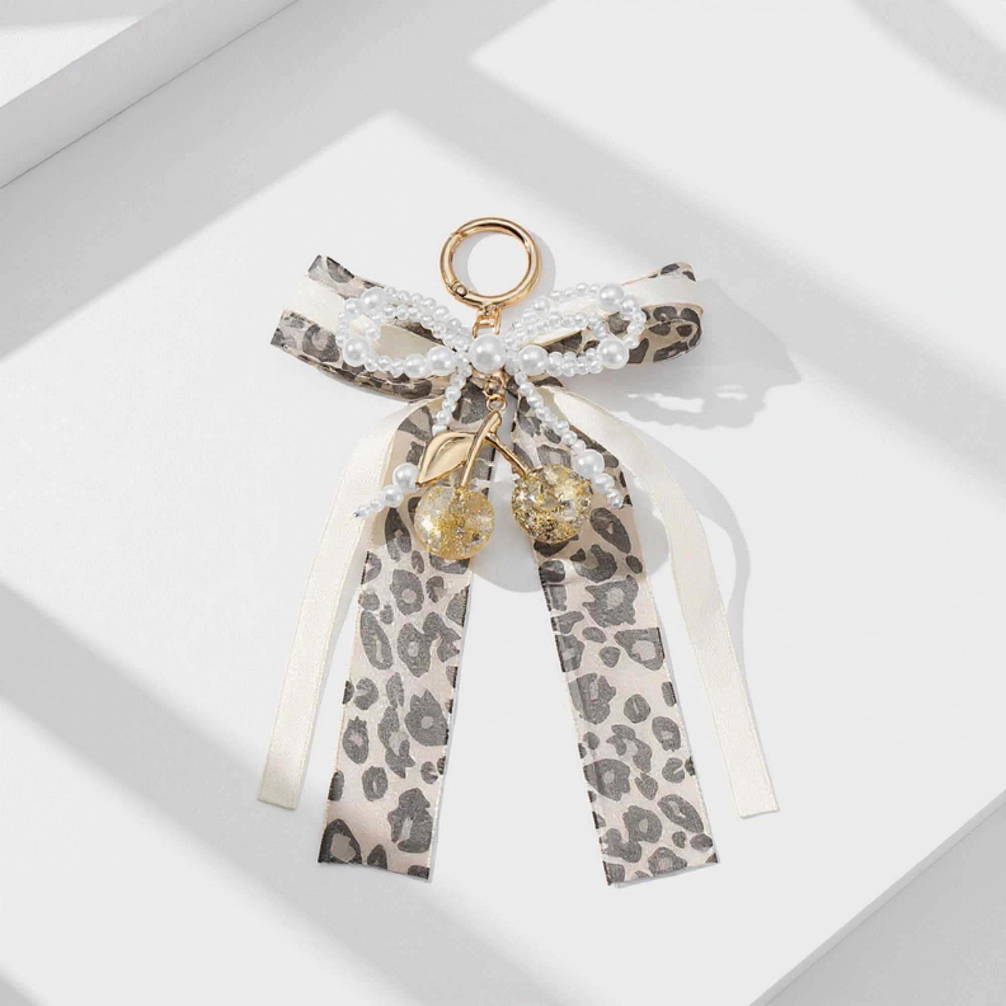 Alilang Women's Fashion Leopard Print Ribbon Keychain with Pearl Bow and Cherry Charms