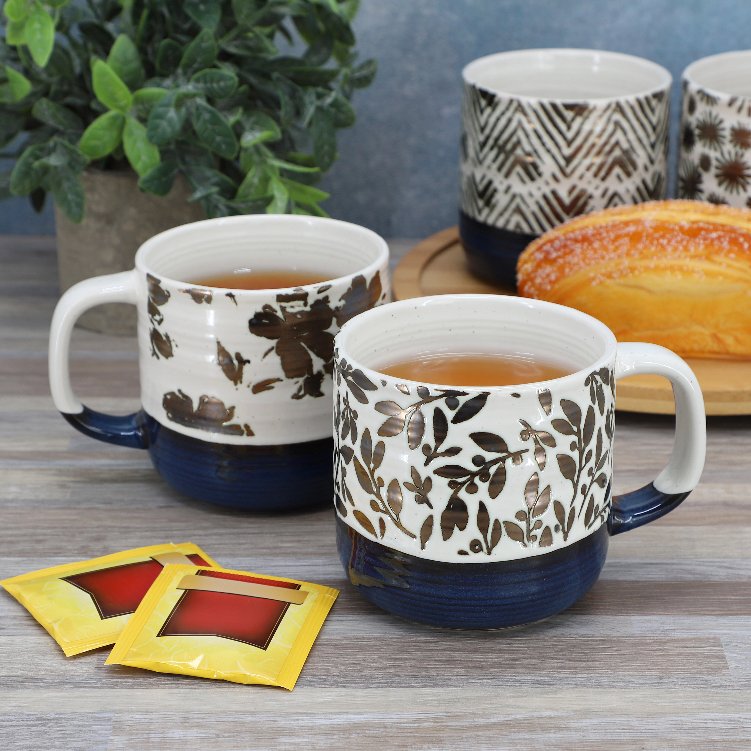 Gibson Home Spruce Garden Assorted 4 Piece 17 Ounce Stoneware Mug Set in Blue