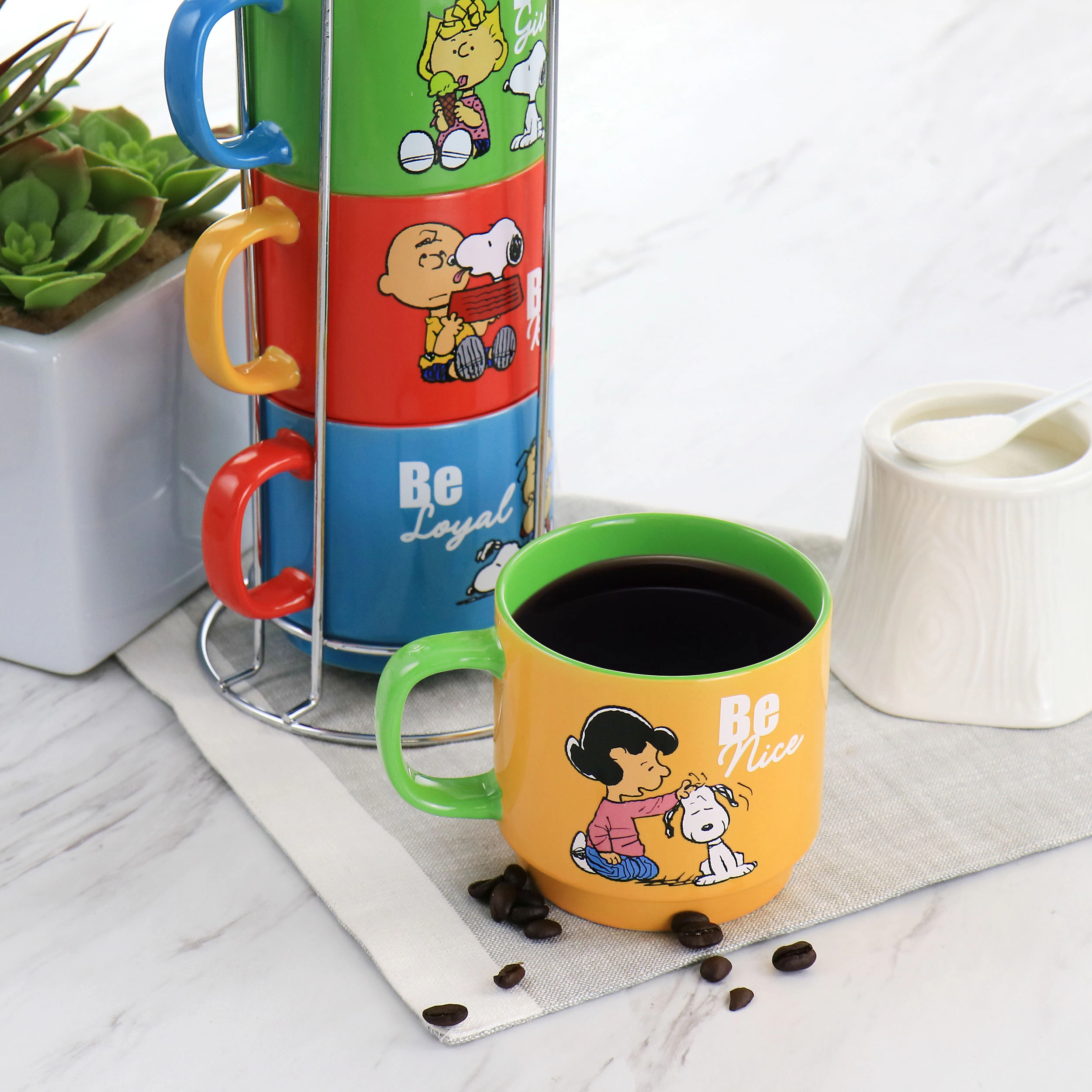 Gibson Peanuts Classic Gentle Reminders Collection 4 Piece Stoneware Stackable Mug Set with Metal Stand
