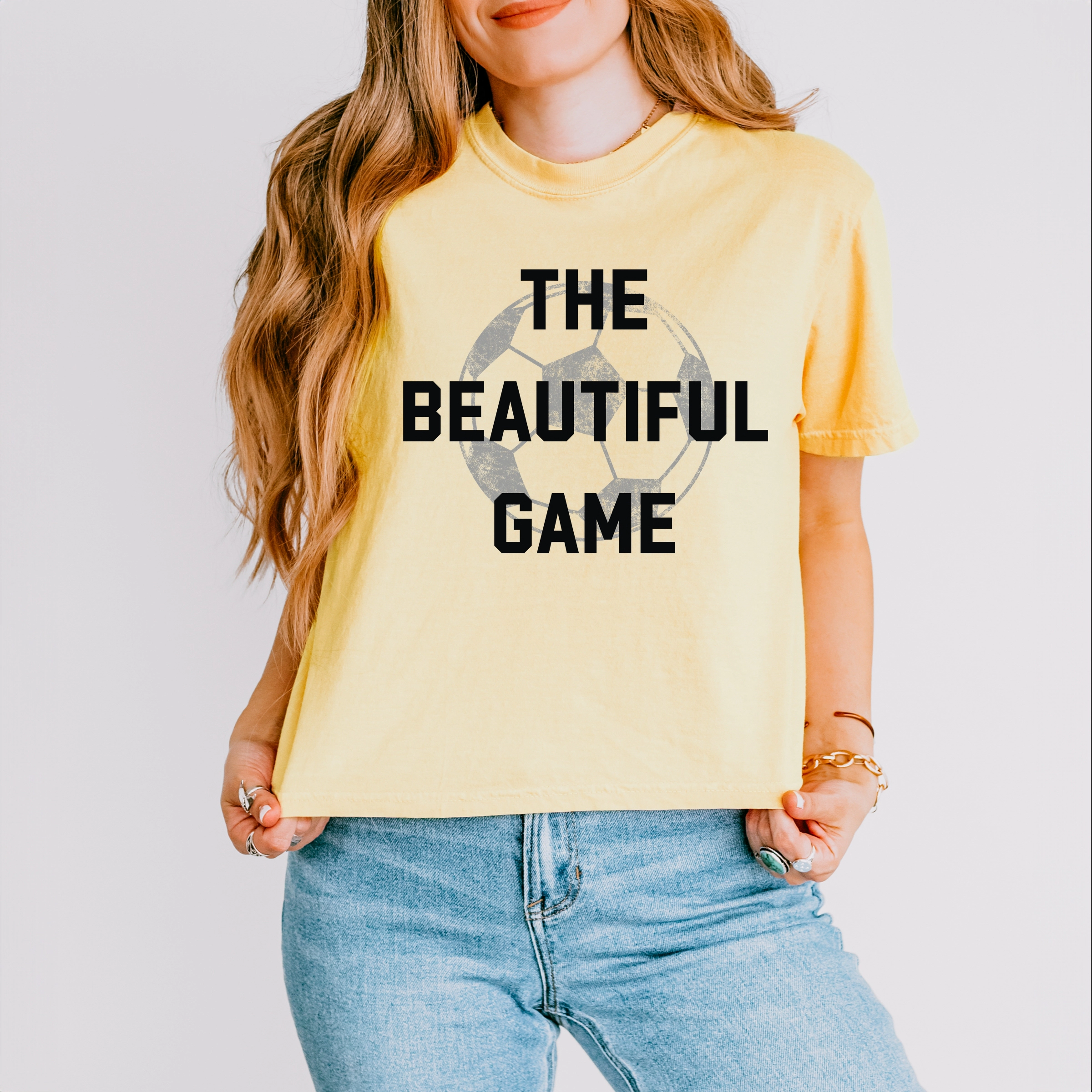 Simply Sage Market - Women's Boxy Crop Top Graphic T-Shirt The Beautiful Game Varsity