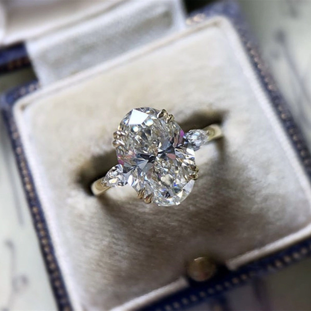 Wardrobe Whimsy Oval Cut Cubic Zirconia Three Stone Engagement Ring for Women