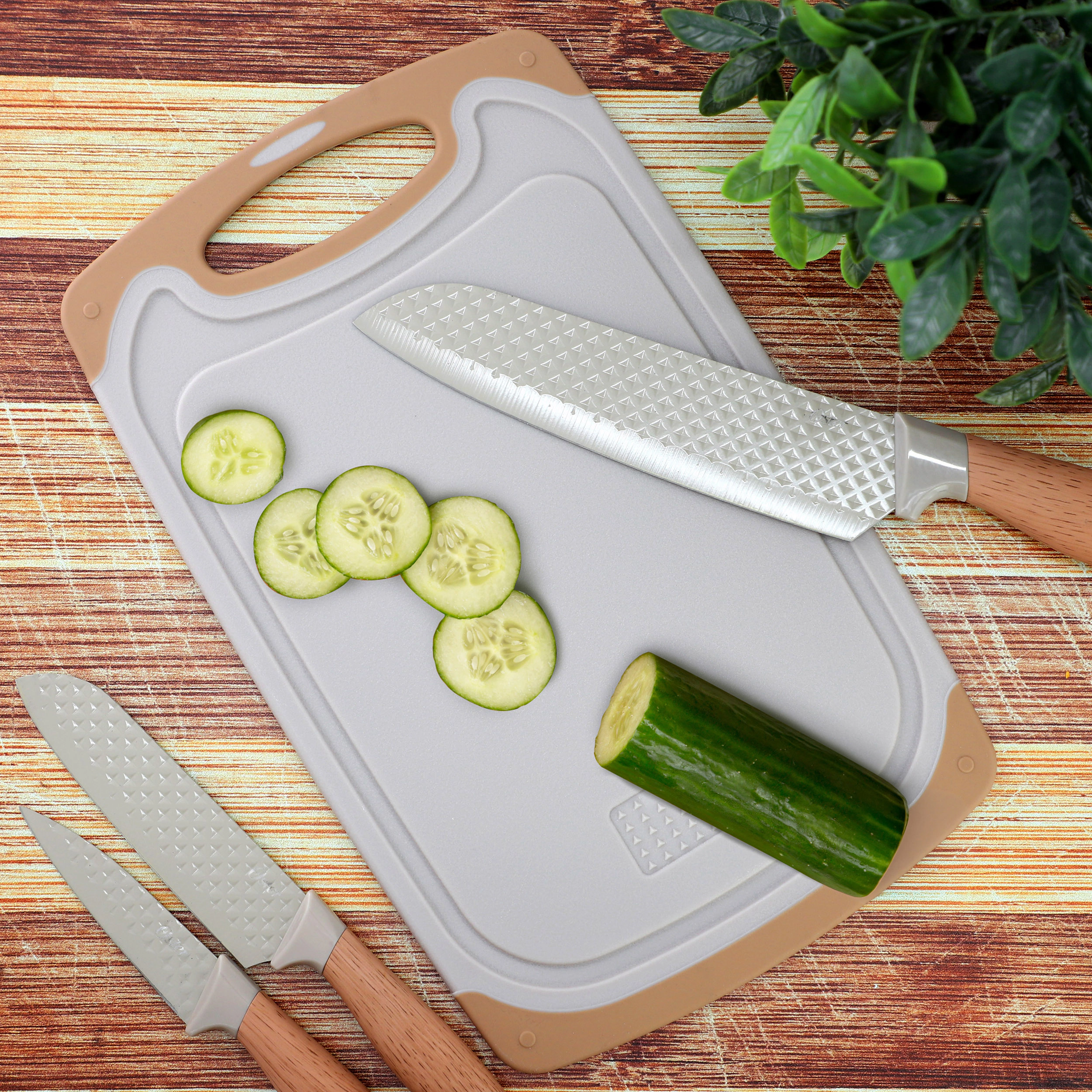 Oster Gunderson 4 Piece Stainless Steel Cutlery and Cutting Board Set in Brown