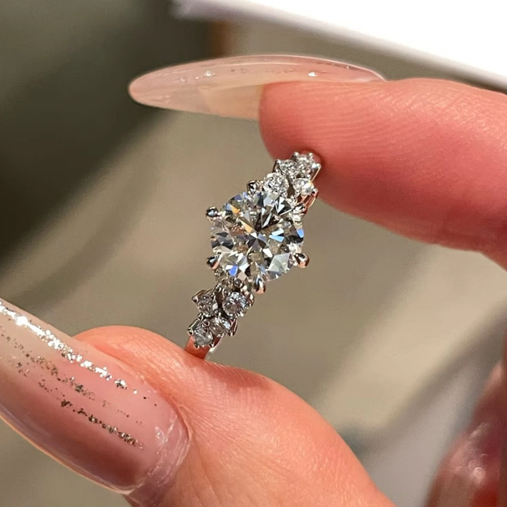 Wardrobe Whimsy Round Cut Cubic Zirconia Side Stone Engagement Ring