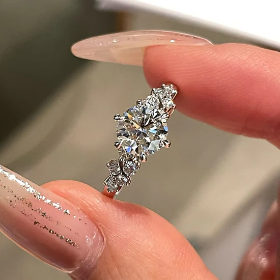 Wardrobe Whimsy Round Cut Cubic Zirconia Side Stone Engagement Ring