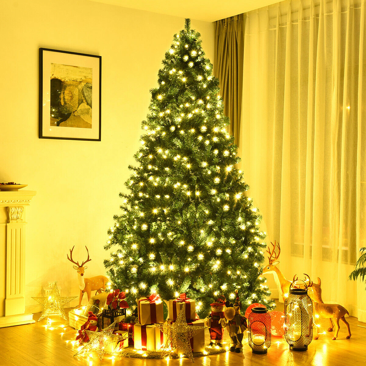 SUGIFT Green PVC Pre-Lit Artificial Christmas Tree with LED Lights and Metal Stand