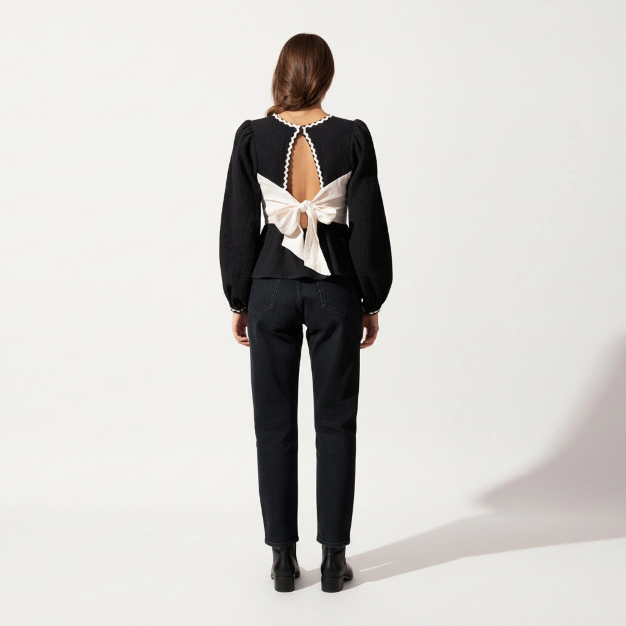 Anna-Kaci Women's Long Sleeve Textured Peplum Top with Contrast Trim Accents Statement Bow Detail