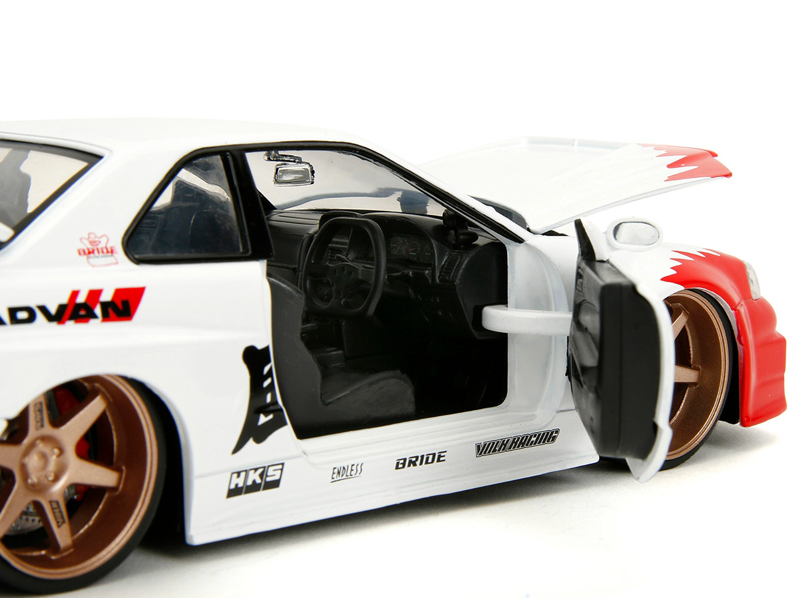 Jada 2002 Nissan Skyline GT-R (R34) RHD (Right Hand Drive) White with Red Graphics and Ryu Diecast Figure
