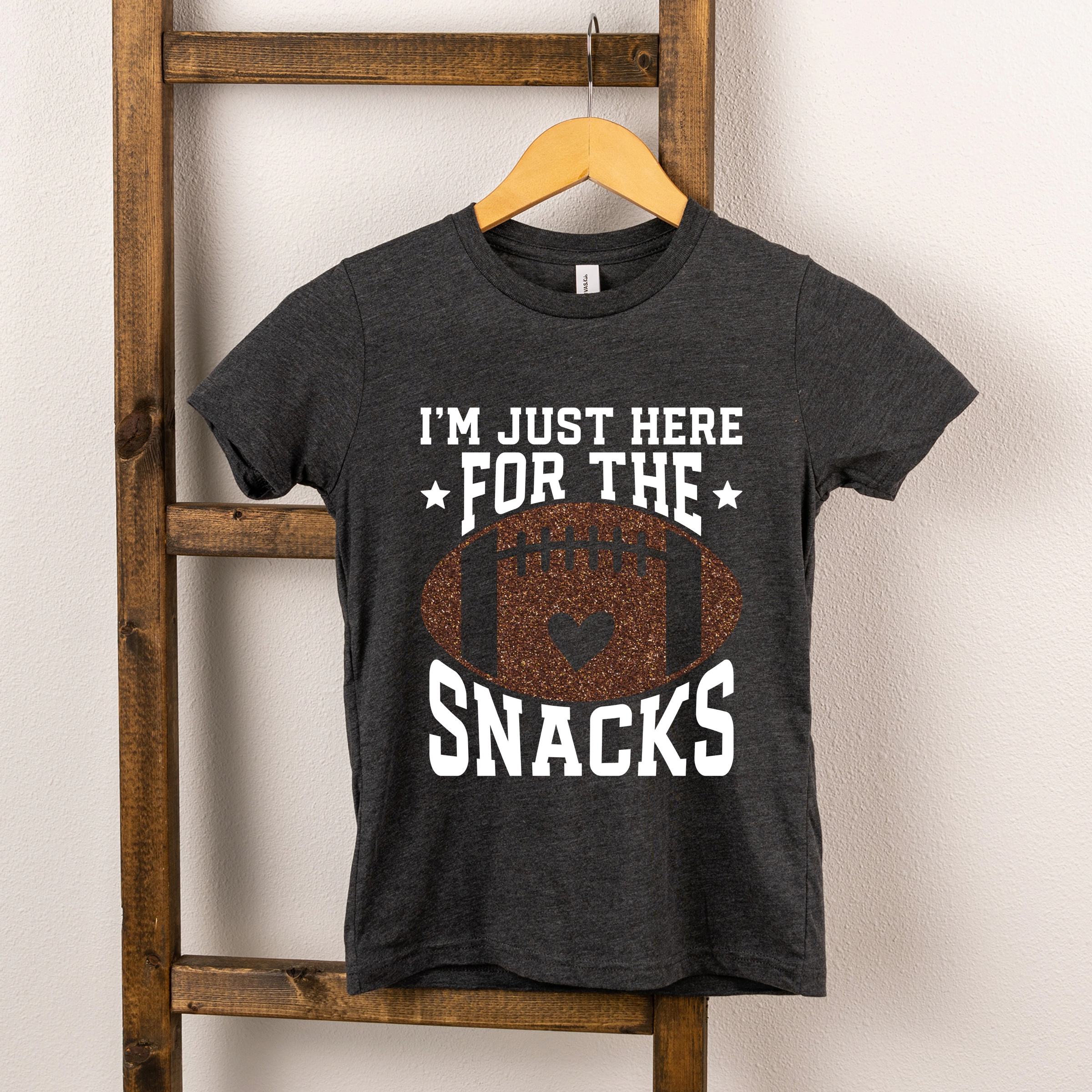 The Juniper Shop - I'm Just Here For Snacks Football Glitter Youth Short Sleeve Graphic T-Shirt