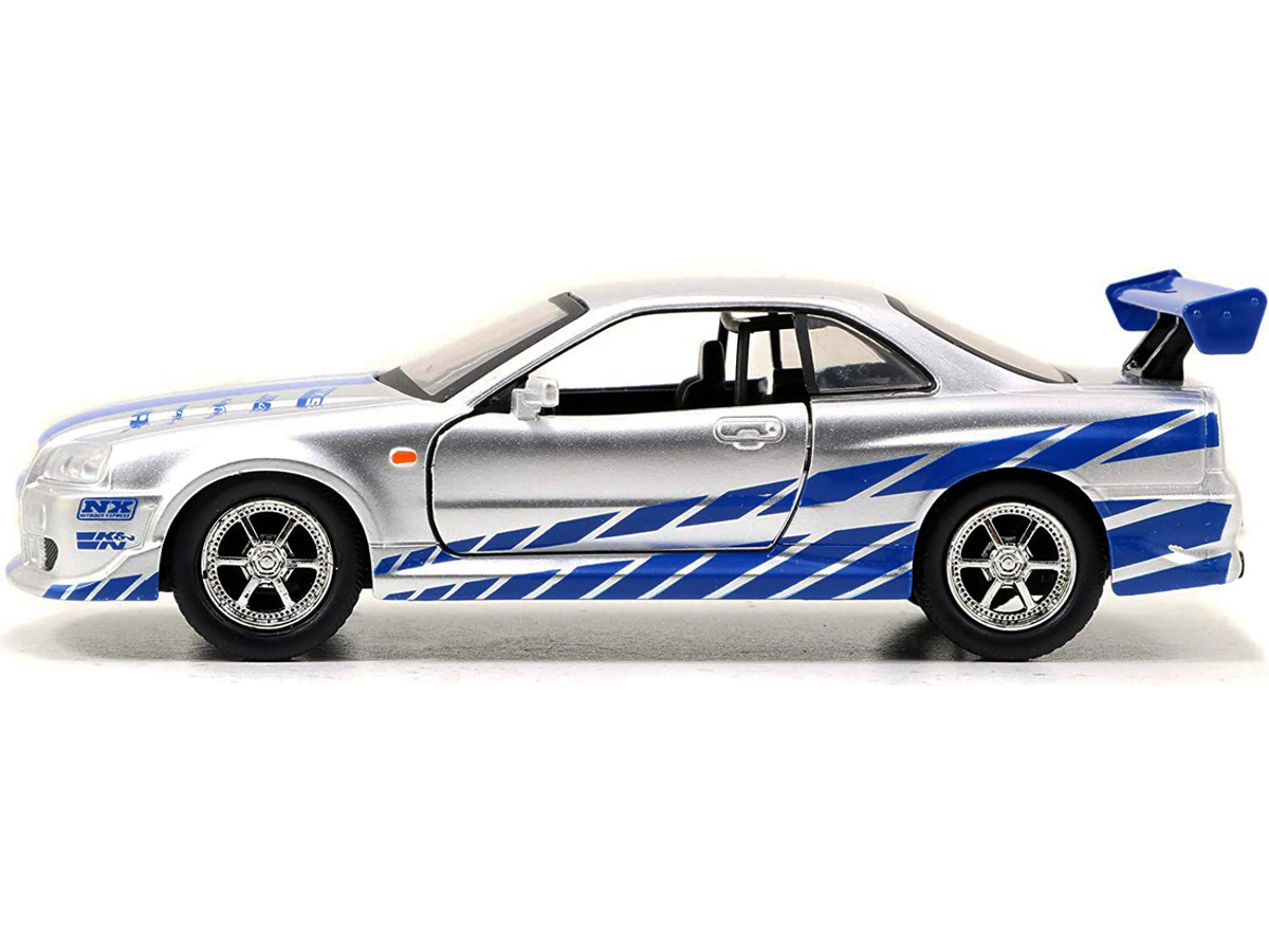 Jada Brian'S Nissan Skyline Gt-R (R34) Rhd (Right Hand Drive) Silver Metallic With Blue Stripes "2 Fast 2