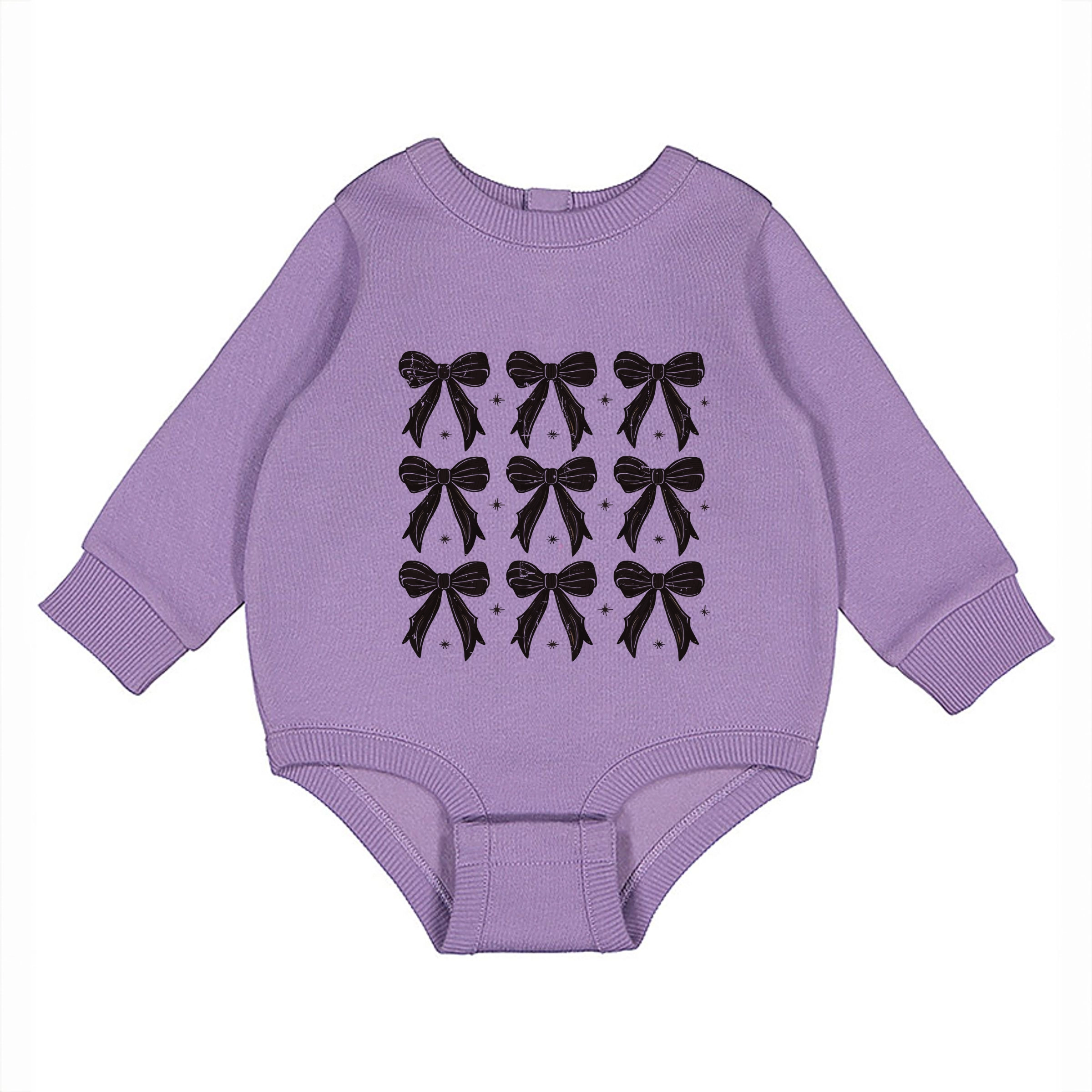 The Juniper Shop - Infant Fleece BodySuit Coquette Black Bows Collage Distressed