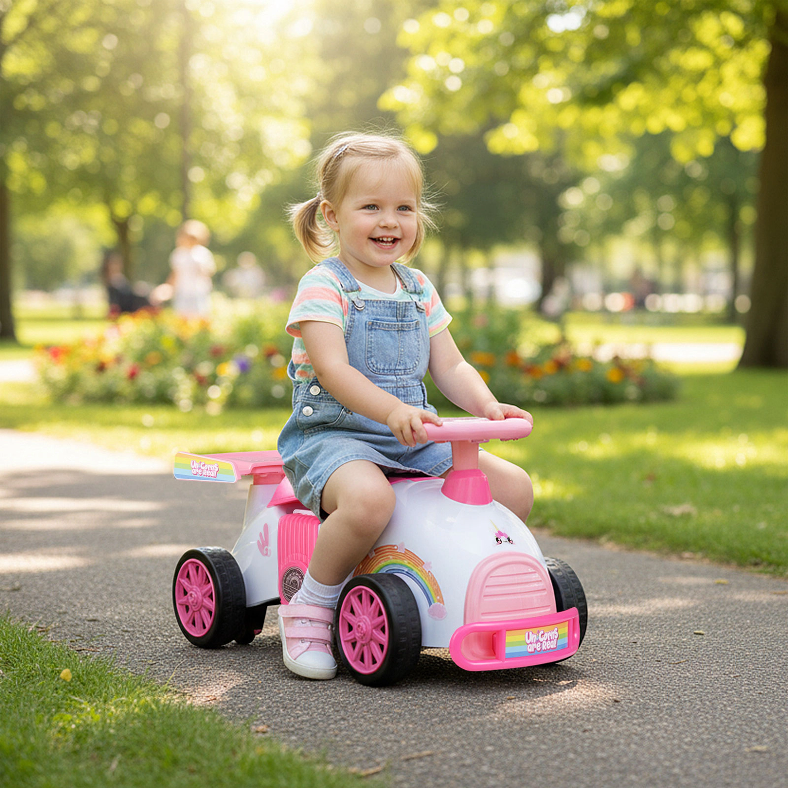 SUGIFT Kids Ride On Car Sliding Toy with Music and Under-Seat Storage 33-lb Capacity Ages 19-36 Months Pink & White