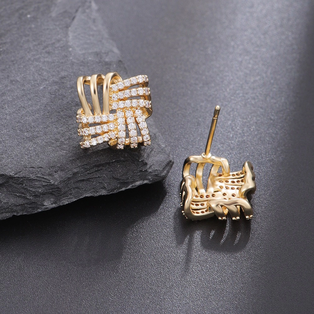 Intertwined Ribbon Pave Cubic Zirconia Huggie Earring