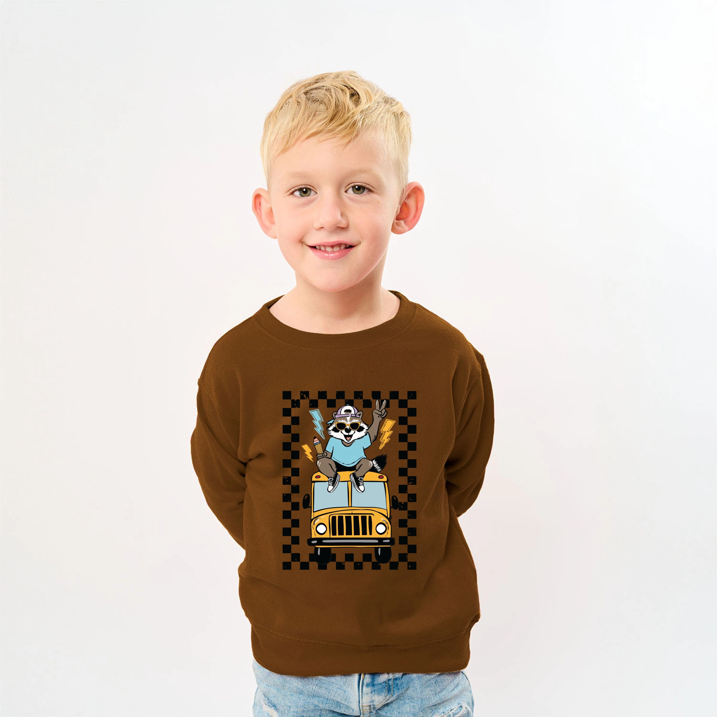 The Juniper Shop - Youth Graphic Sweatshirt Racoon School Bus Lightning