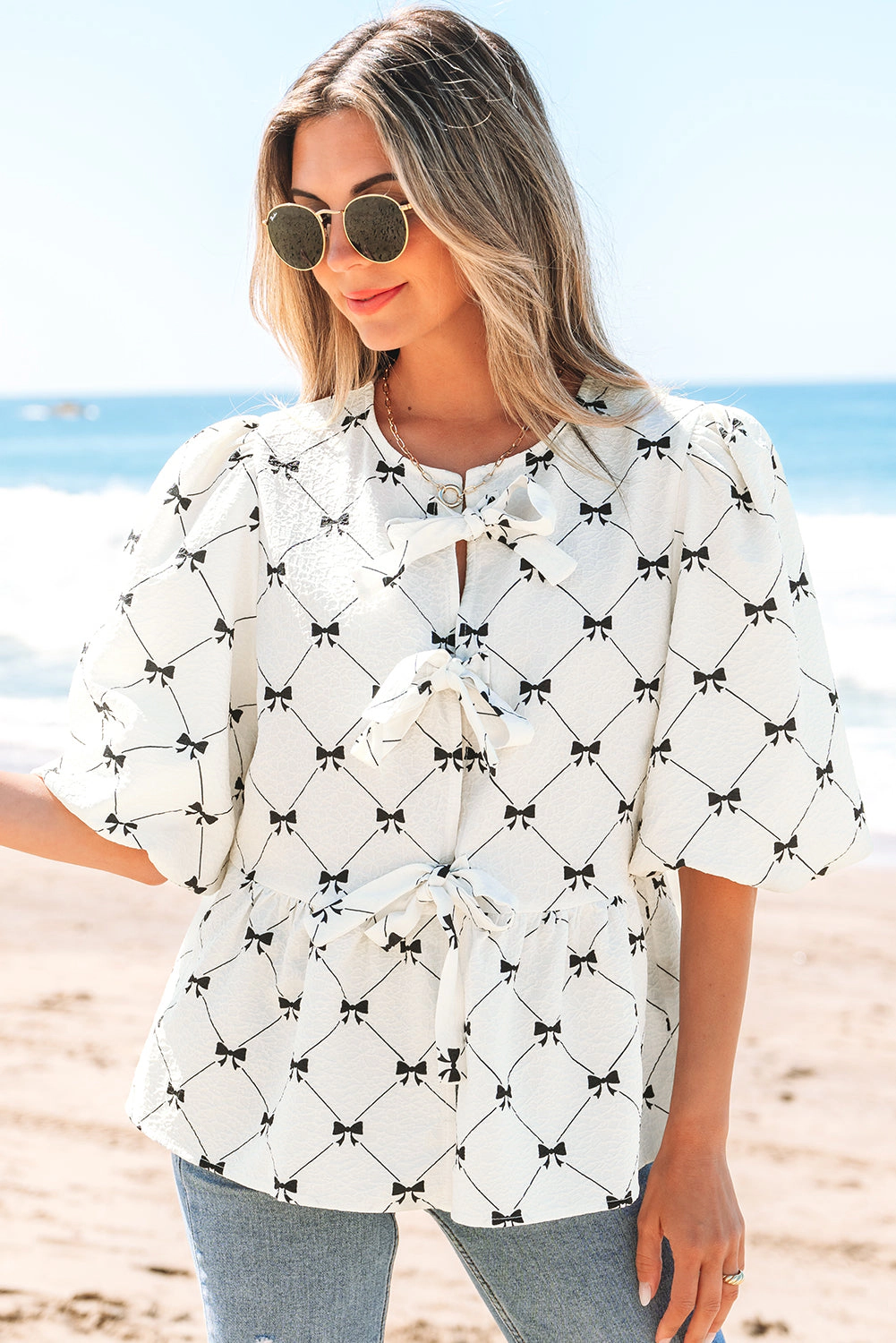 Threaded Pear Women's Ezra Bowknot Print Front Knots Bubble Sleeve Blouse