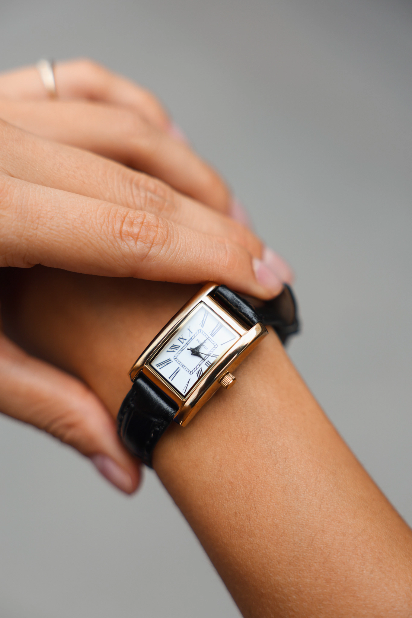 Peugeot Women's 34x20mm White Roman Dial Tank Dress Watch with Black Leather Strap