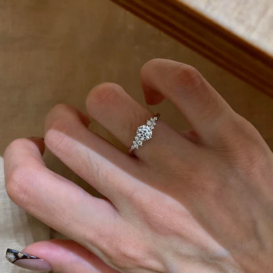 Wardrobe Whimsy Round Cut Cubic Zirconia Side Stone Engagement Ring